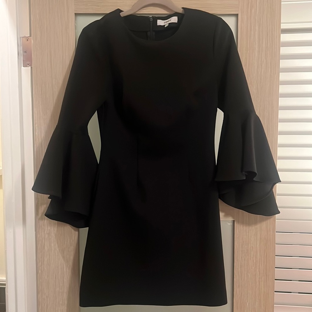 Black mini dress with ruffled sleeve